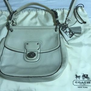 Authentic Coach Saddle bag in white color
